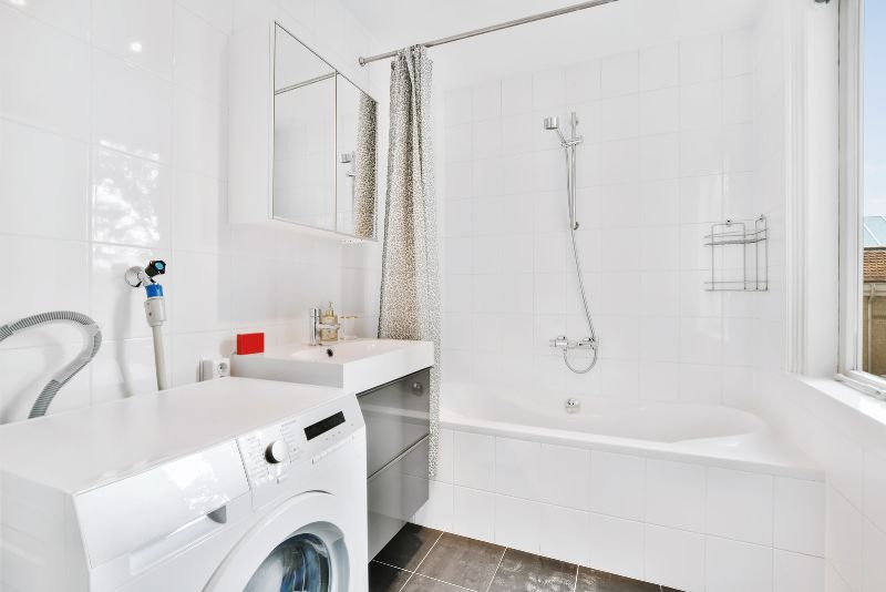 Front-load washing machine fitted into a renovated Townsville laundry