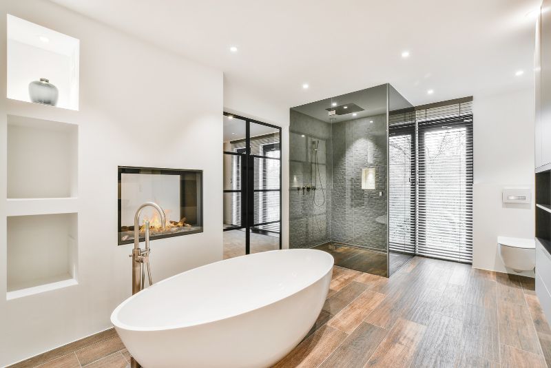 Fully renovated bathroom with freestanding tub and walk-in shower in Townsville